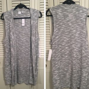 New York and a Company sleeveless cardigan.